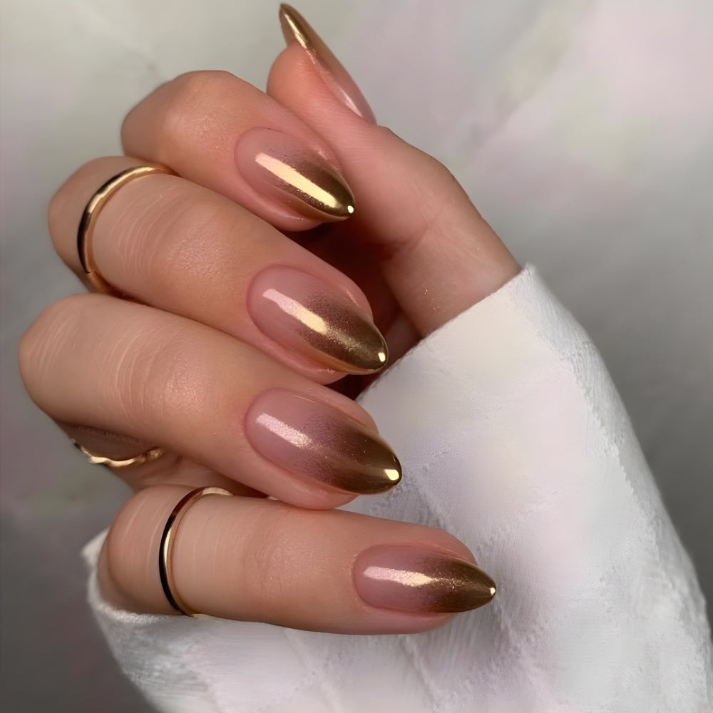 Gold-gradient press-on nails with a pink base